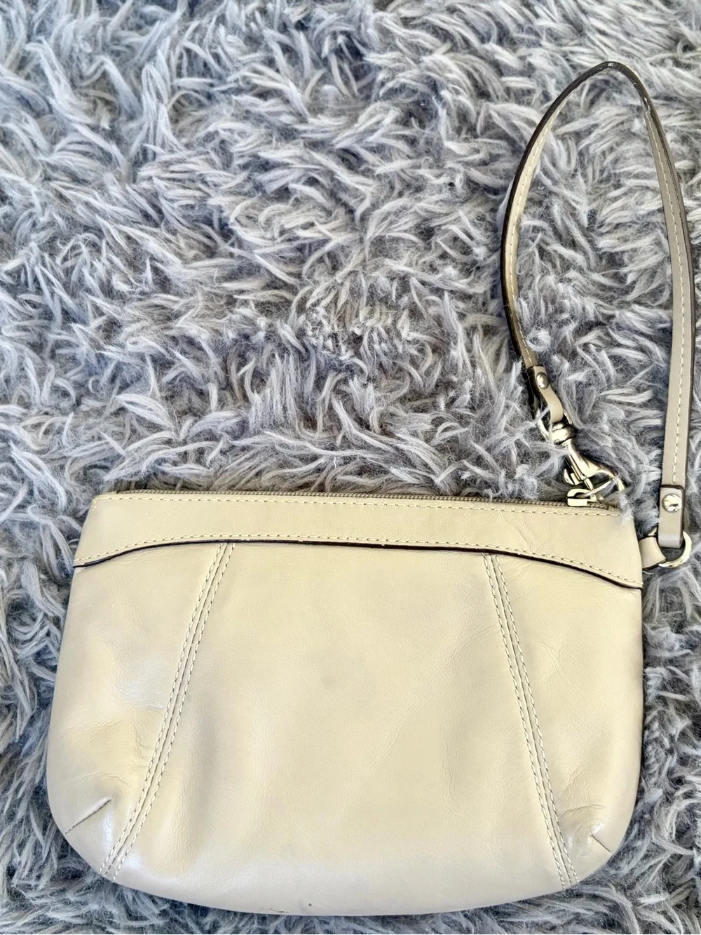 Coach ivory leather wristlet clutch with gold logo baby blue inside